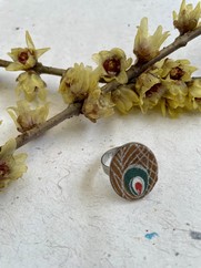 ANELLO OVALE  IN TESSUTO OCCHIO VERDE 