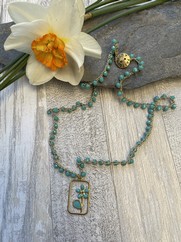 COLLANA UNCINETTO TARGHETTA FIORE TURCHESE