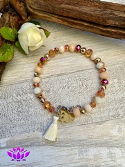 BRACCIALE RIGIDO CON CRISTALI CARAMELLO E NAPPINA