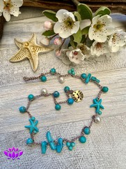 BRACCIALE GIROGOLA CON STELLE MARINE TURCHESE
