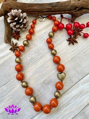 COLLANA IN RESINA CUORE ORO E ZUCCA
